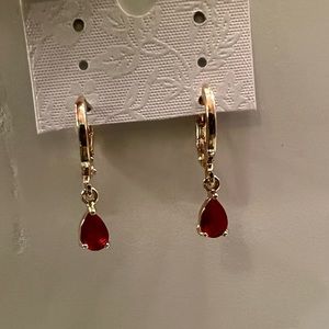 3 pairs of cute earrings. Gold with Pink, green, and red. All in good condition.